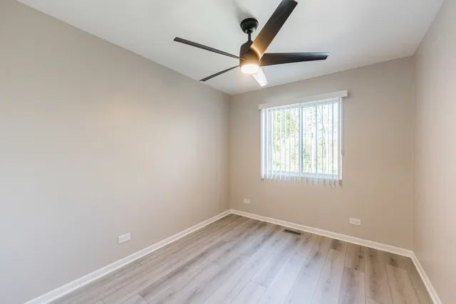 a bathroom with a sink toilet tub and shower