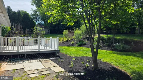 a view of a deck with a yard