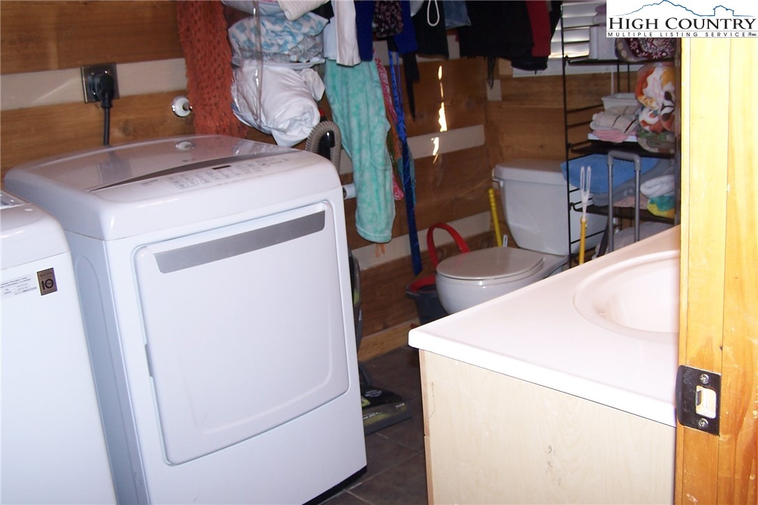 3545 Wildcat Road Deep Gap, NC 28618 - Photo 15 of 24 a utility room with dryer and washer