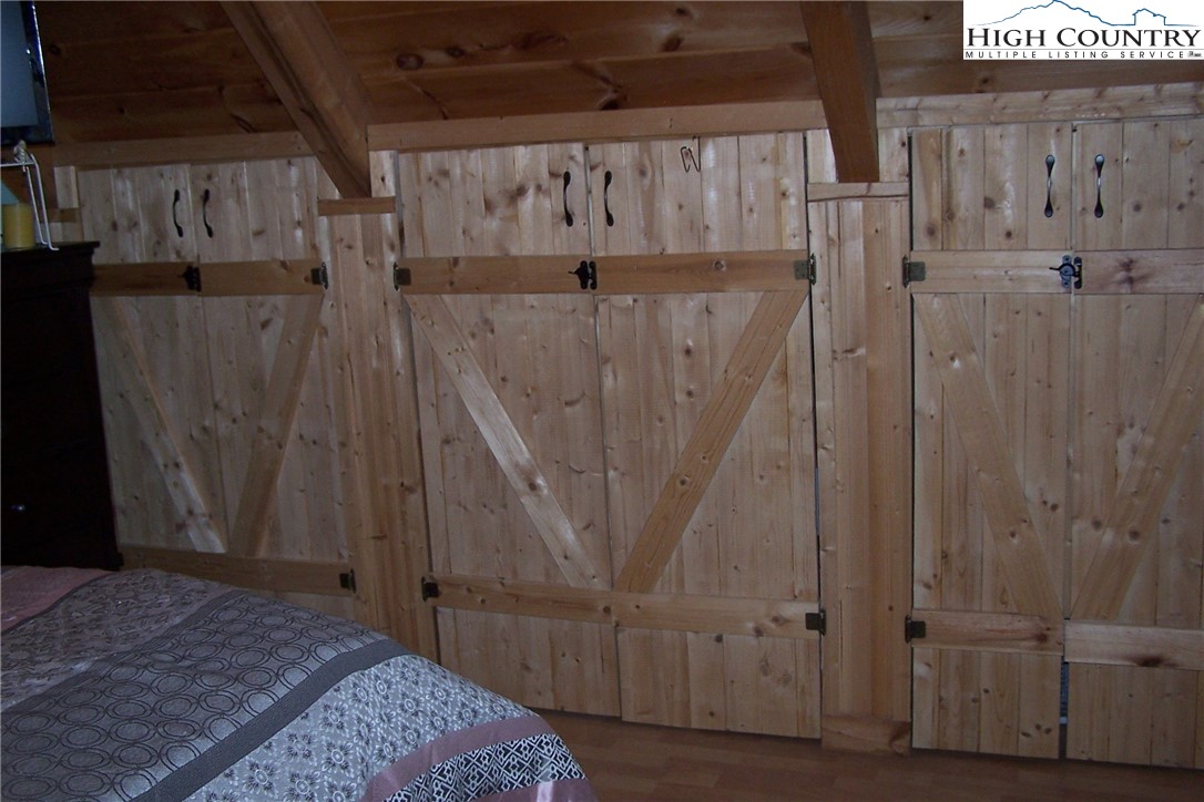 3545 Wildcat Road Deep Gap, NC 28618 - Photo 17 of 24 a view of bedroom with wooden floor