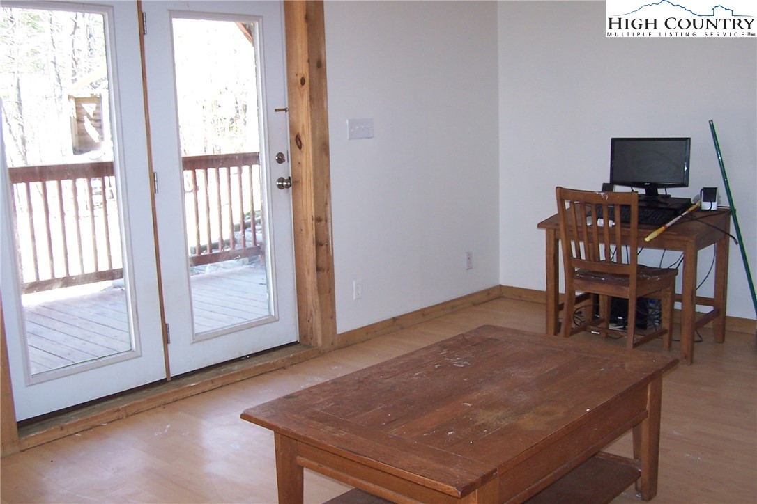3545 Wildcat Road Deep Gap, NC 28618 - Photo 19 of 24 a view of a workspace with furniture and a window