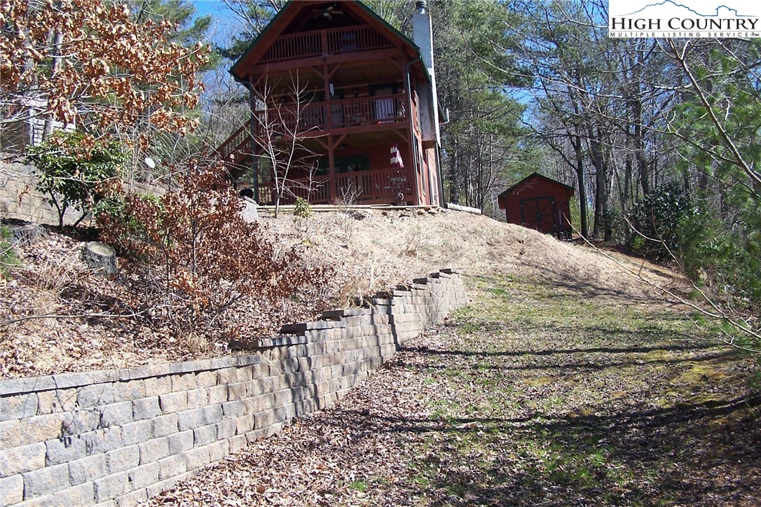 3545 Wildcat Road Deep Gap, NC 28618 - Photo 2 of 24 a view of a backyard of the house