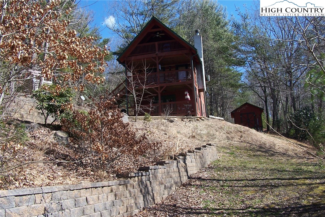 3545 Wildcat Road Deep Gap, NC 28618 - Photo 3 of 24 a view of a house with a yard