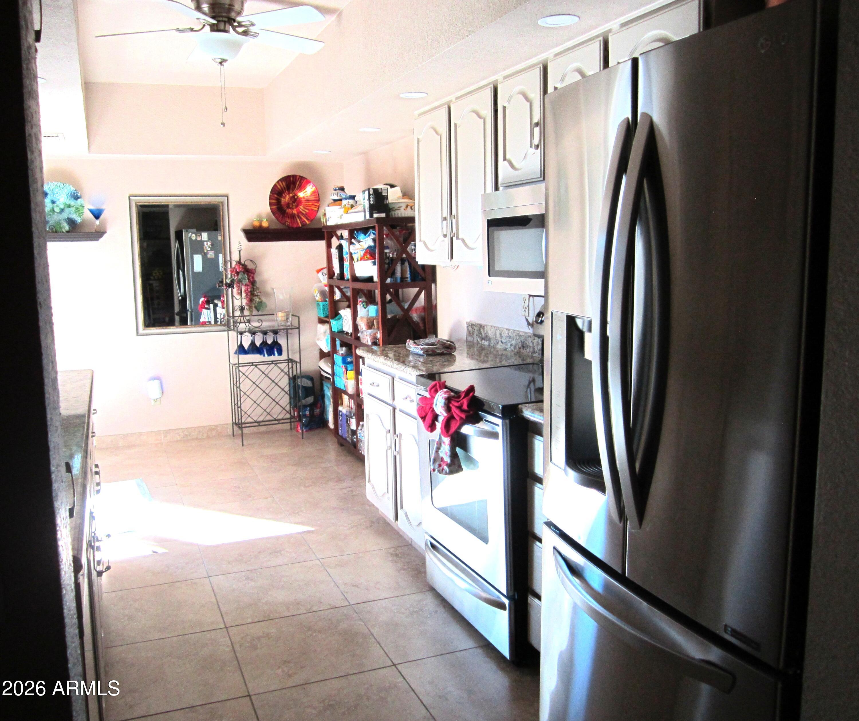 4303 East Cactus Road, Unit 423 Phoenix, AZ 85032 - Photo 6 of 39 a view of a storage & utility room