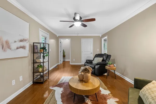 a workspace with furniture and wooden floor