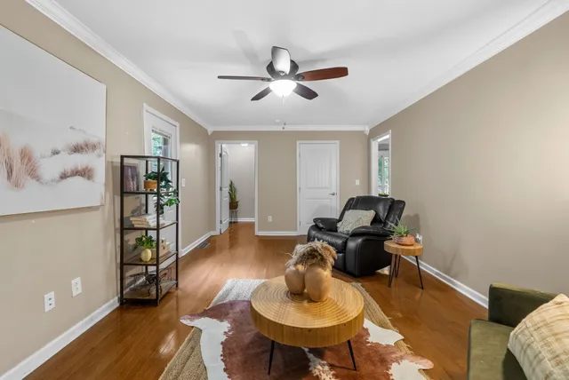 a workspace with furniture and wooden floor