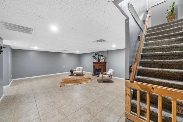 a bed room with a bed and a mirror