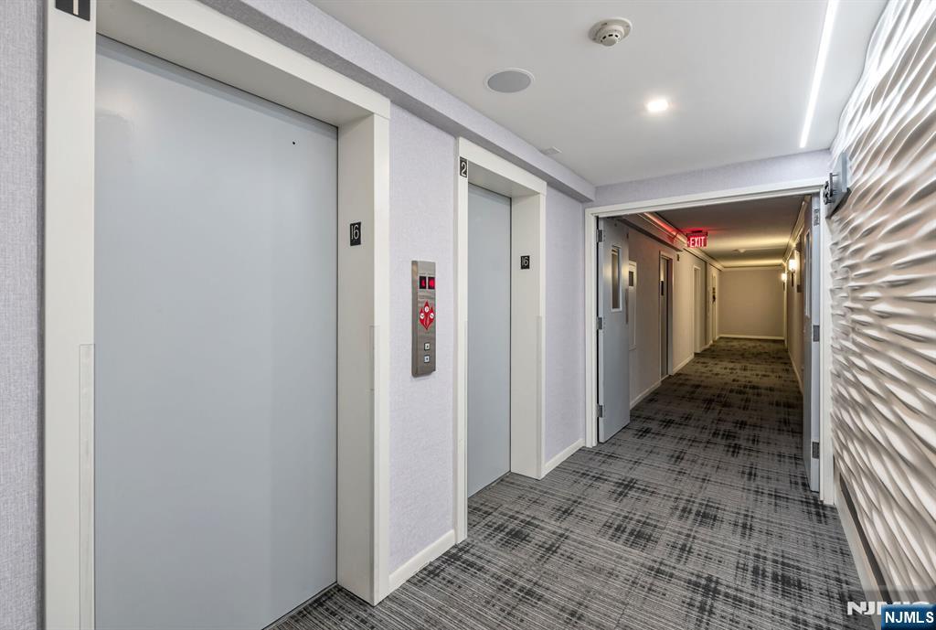 125 Prospect Avenue, Unit 16C Hackensack, NJ 07601 - Photo 5 of 35 a view of a hallway