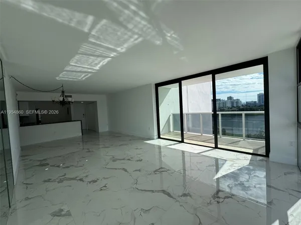 a bathroom with a toilet sink and shower