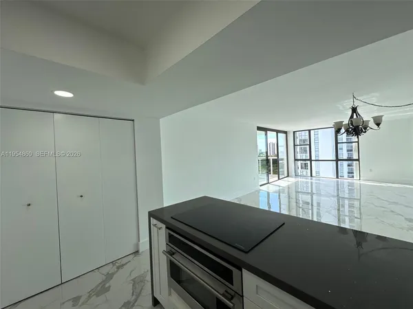 a view of an empty room and window