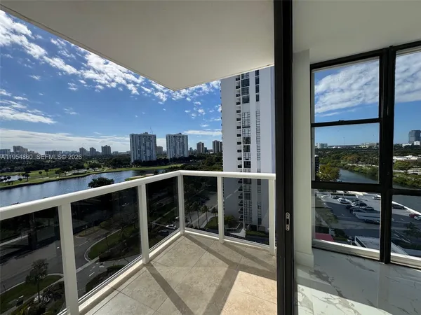 a view of balcony with furniture