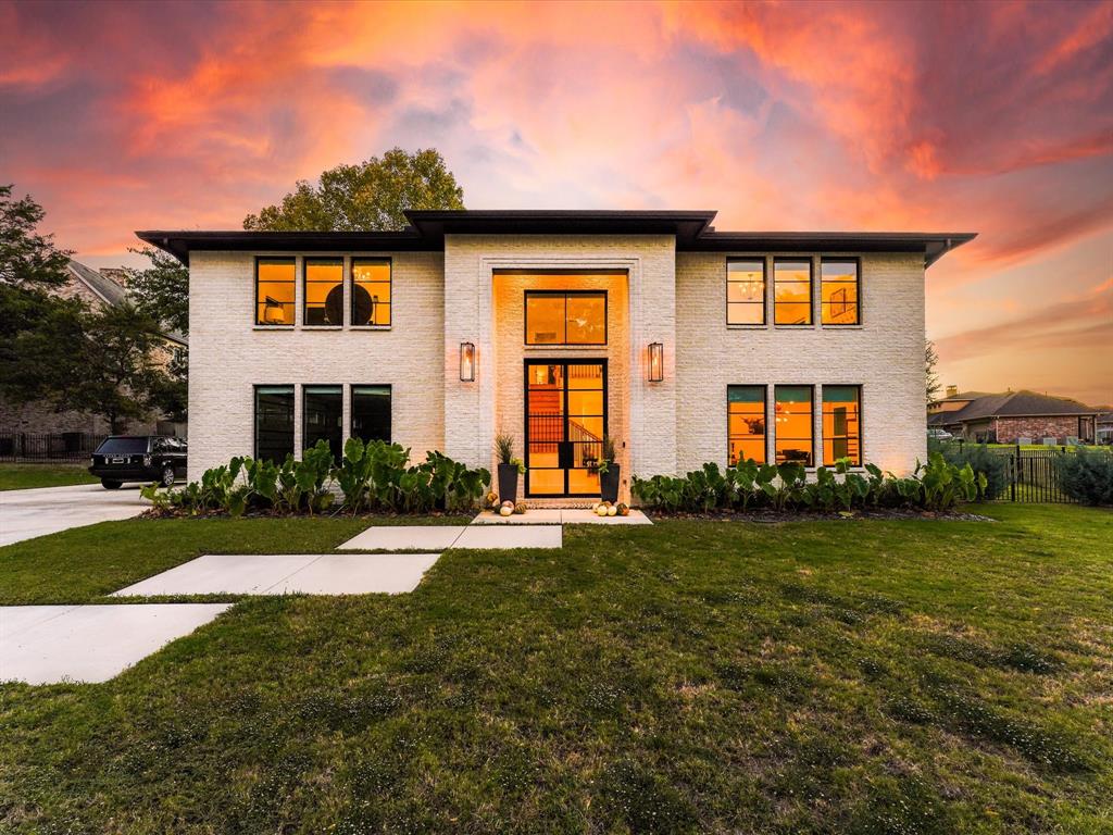 3 Bright Meadows Road Heath, TX 75032 - Photo 1 of 1 a front view of a house with a yard