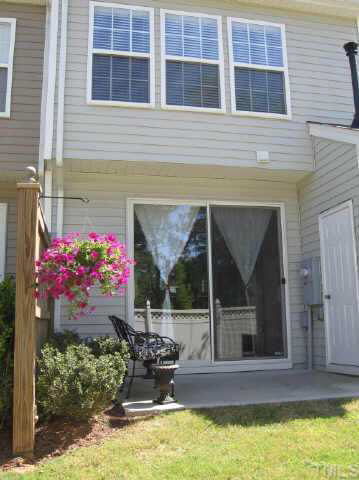 1711 Sorrell Brook Way Raleigh, NC 27609 - Photo 3 of 7 a swimming pool with outdoor seating and yard