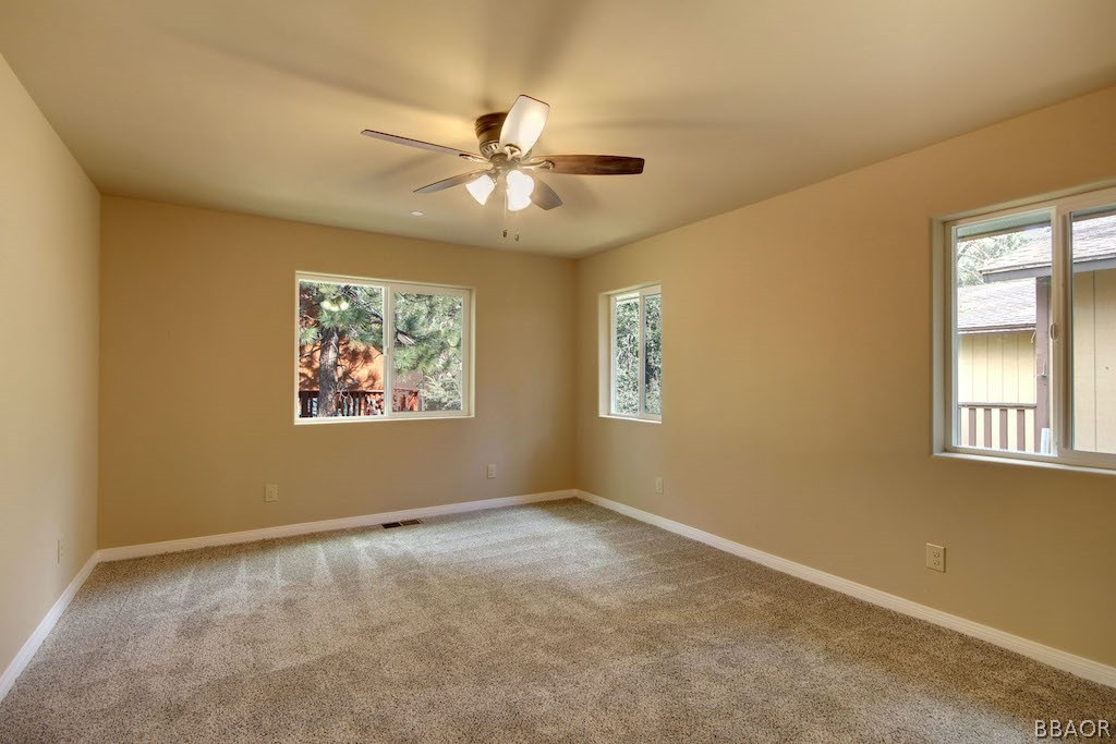 369 Riverside Avenue Sugarloaf, CA 92386 - Photo 16 of 30 a view of an empty room with a window