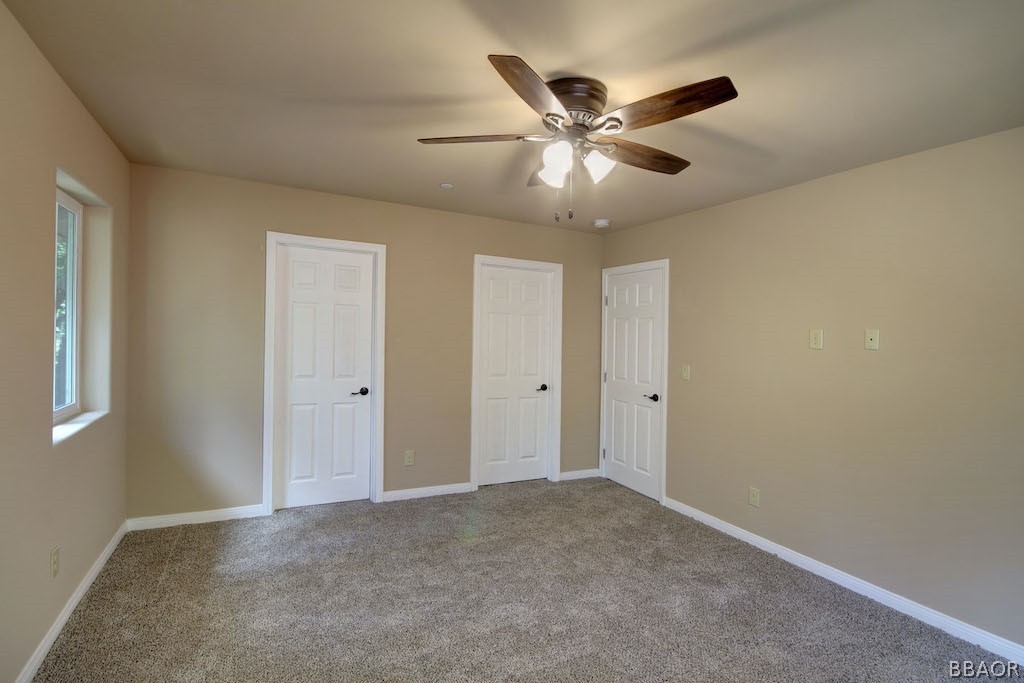369 Riverside Avenue Sugarloaf, CA 92386 - Photo 17 of 30 a view of a ceiling fan in a room