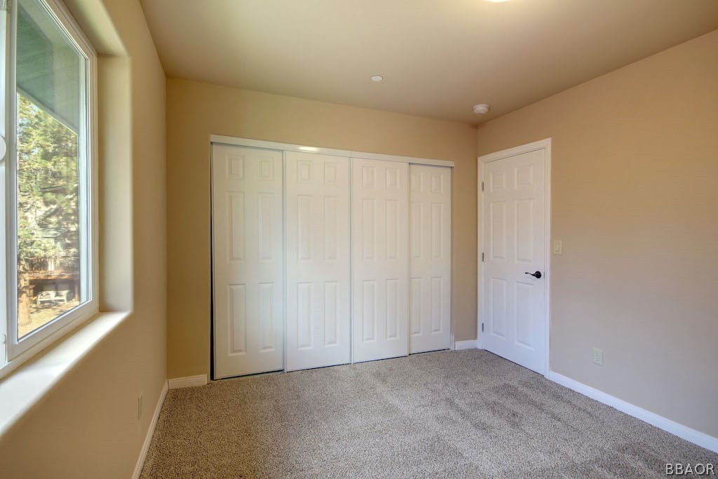 369 Riverside Avenue Sugarloaf, CA 92386 - Photo 24 of 30 a view of an empty room and a window