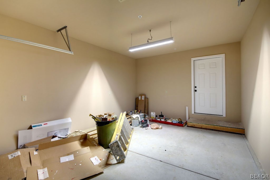 369 Riverside Avenue Sugarloaf, CA 92386 - Photo 30 of 30 a view of a room with gym equipment and windows