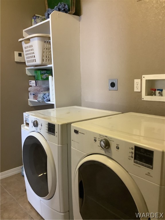 4024 Canelo Road Golden Valley, AZ 86413 - Photo 25 of 35 a utility room with dryer and washer