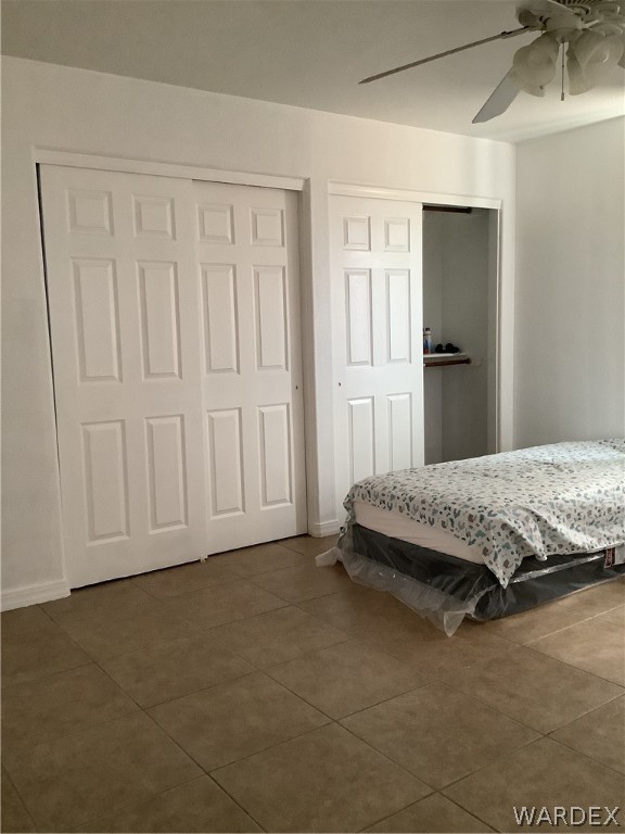 4024 Canelo Road Golden Valley, AZ 86413 - Photo 27 of 35 a bedroom with a bed and a cabinet