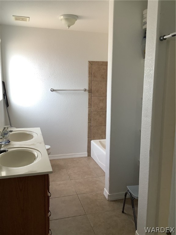 4024 Canelo Road Golden Valley, AZ 86413 - Photo 30 of 35 a bathroom with a sink and a mirror