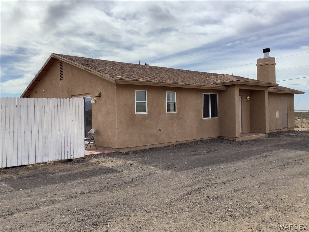 4024 Canelo Road Golden Valley, AZ 86413 - Photo 3 of 35 a view of a house with a backyard