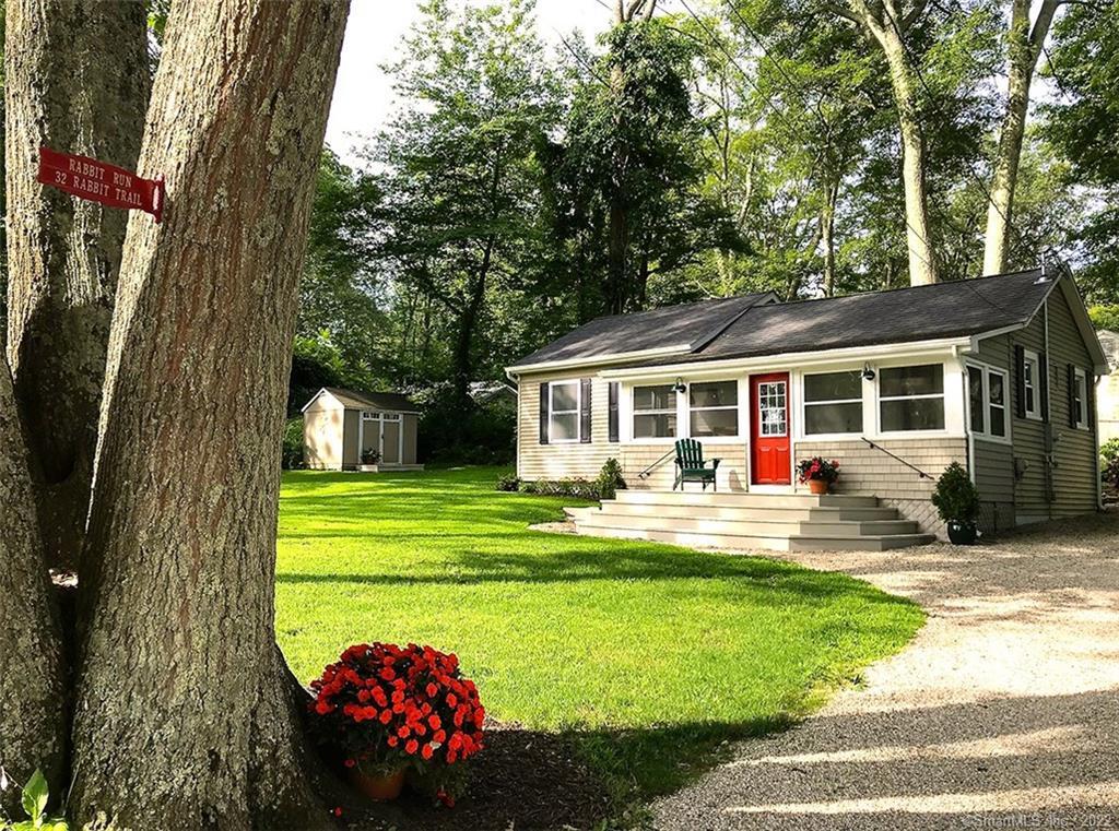 32 Rabbit Trail Coventry, CT 06238 - Photo 1 of 1 a front view of a house with swimming pool having outdoor seating