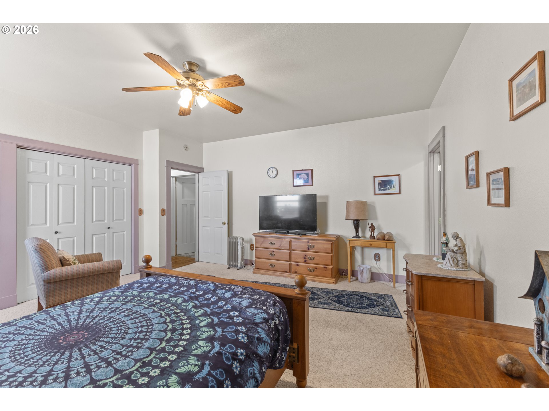 208 7th Street Myrtle Point, OR 97458 - Photo 27 of 48 a bedroom with a bed and furniture