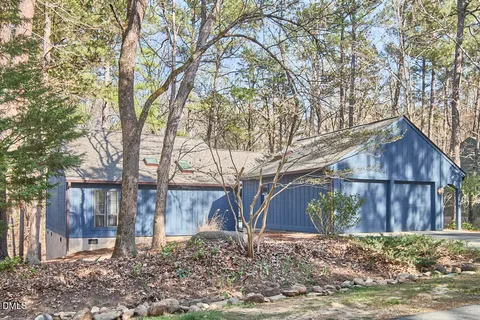 a view of a yard covered in snow
