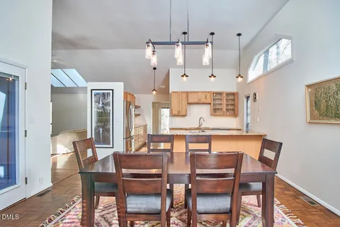 a view of a dining room with furniture