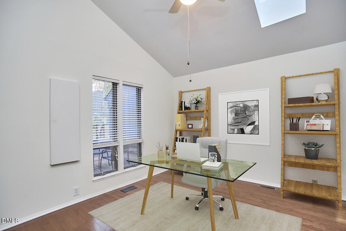 251 Fox Ridge Road Pittsboro, NC 27312 - Photo 28 of 29 a view of a workspace with furniture and a window