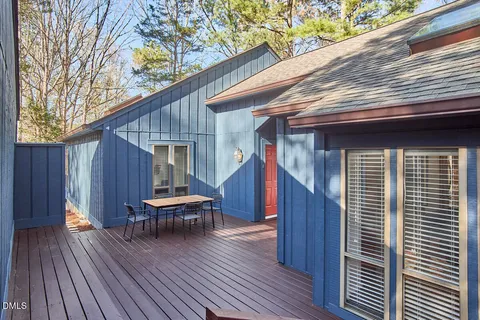 a view of a two chairs on the roof deck