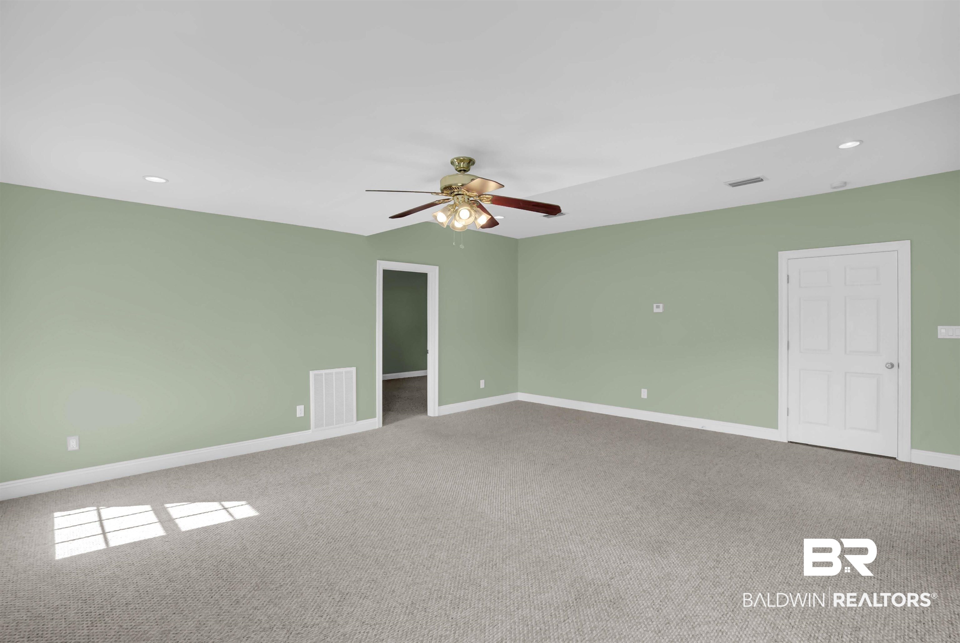 27688 Rigsby Road Daphne, AL 36526 - Photo 40 of 56 Empty room featuring ceiling fan and carpet