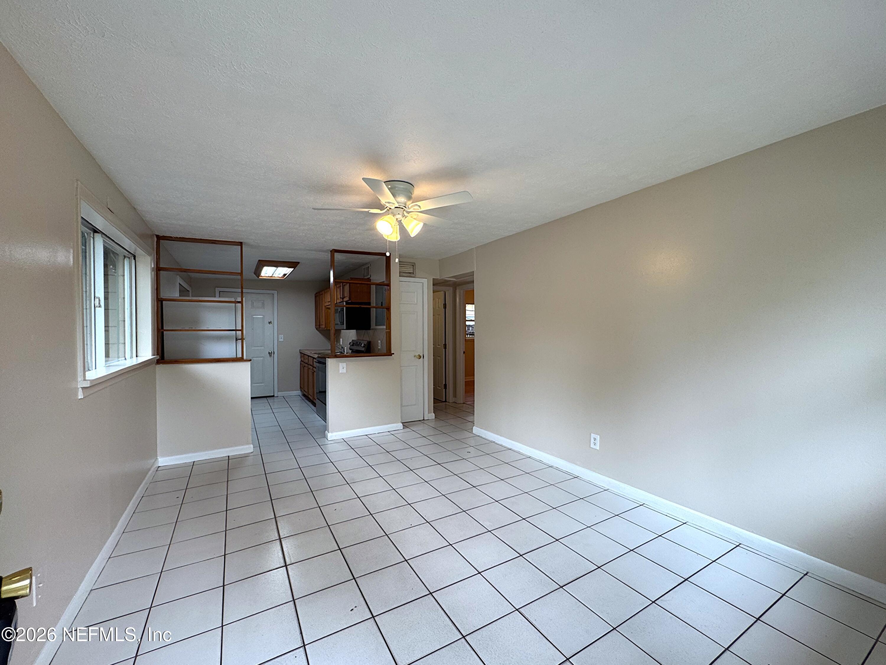 4464 Spring Glen Road, Unit 4464 Jacksonville, FL 32207 - Photo 5 of 15 IMG_2936