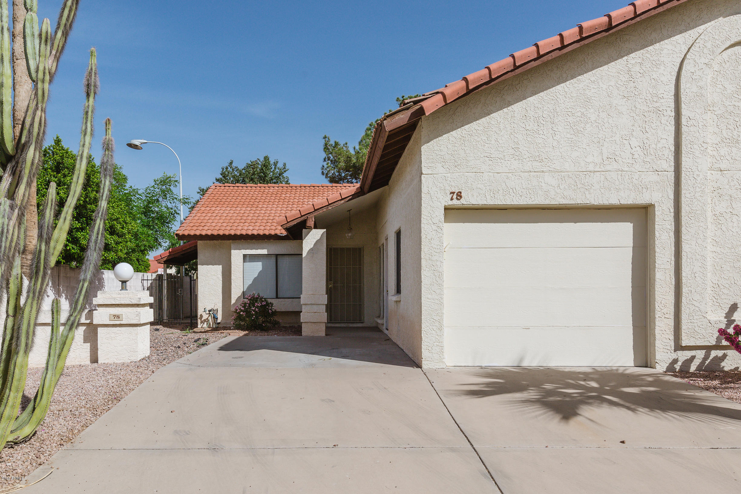 542 South Higley Road, Unit 78 Mesa, AZ 85206 - Photo 1 of 17 a view of a house with backyard and porch