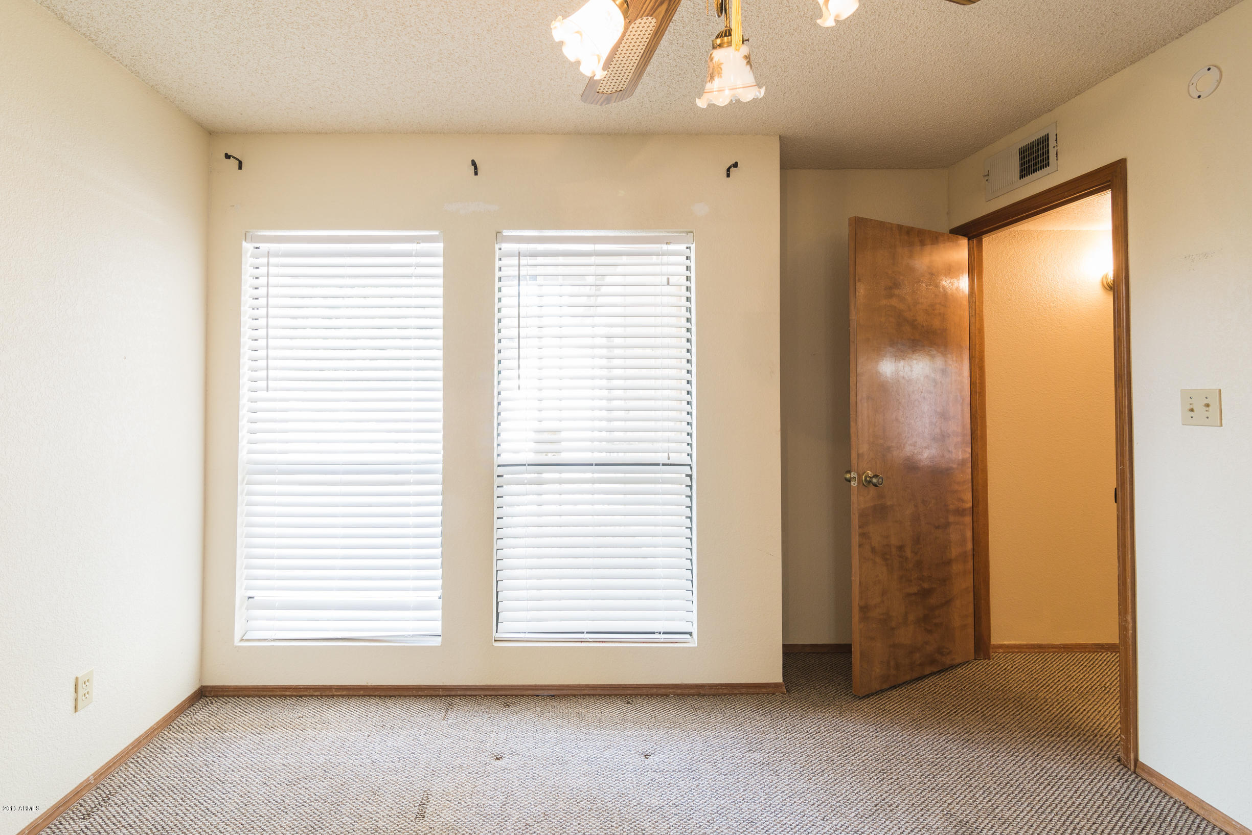 542 South Higley Road, Unit 78 Mesa, AZ 85206 - Photo 15 of 17 a view of empty room with window