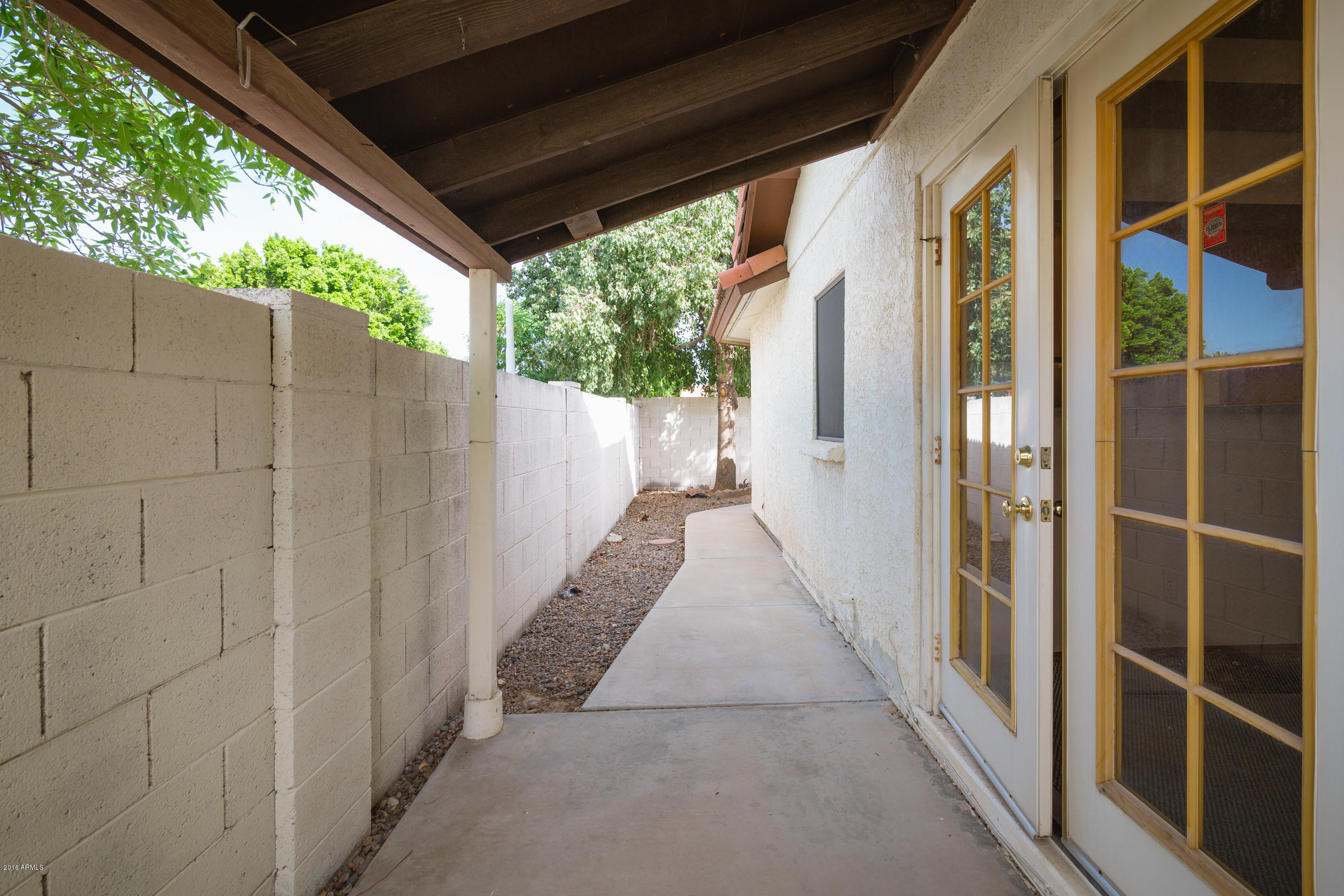 542 South Higley Road, Unit 78 Mesa, AZ 85206 - Photo 16 of 17 a view of a house with porch