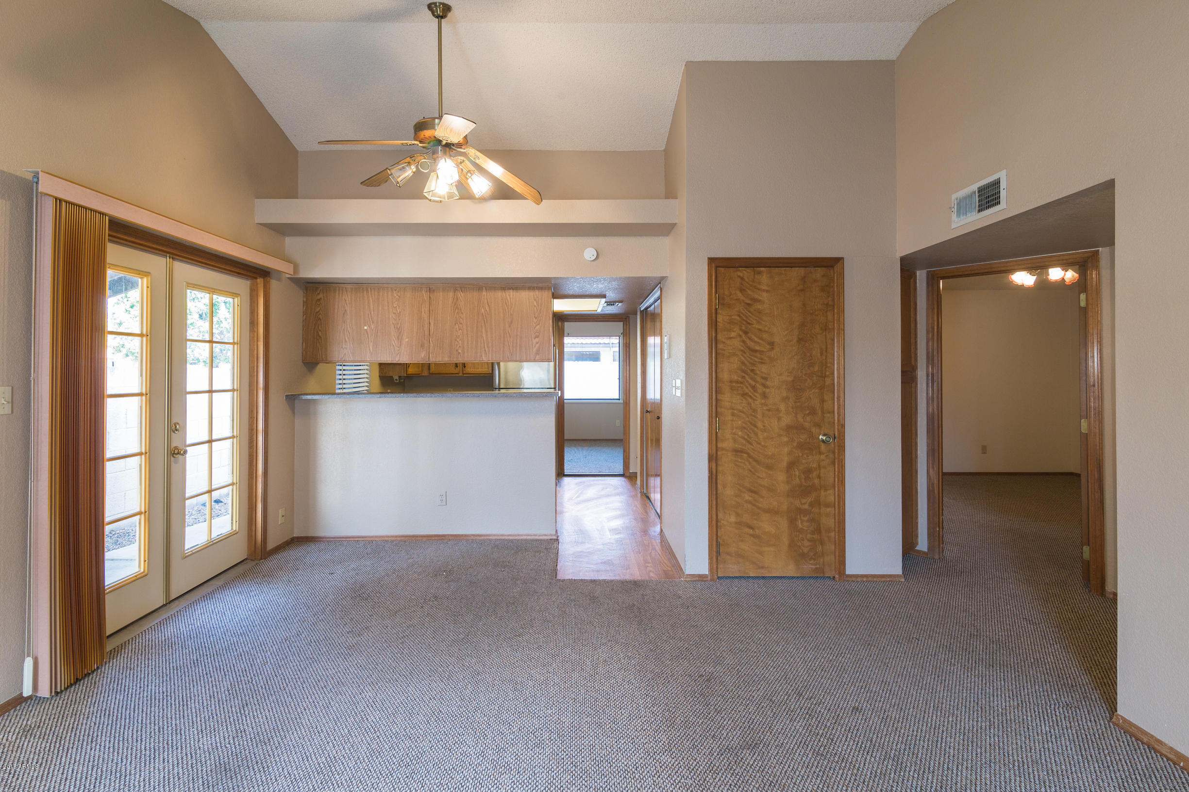 542 South Higley Road, Unit 78 Mesa, AZ 85206 - Photo 5 of 17 a view of a kitchen with a sink and a window