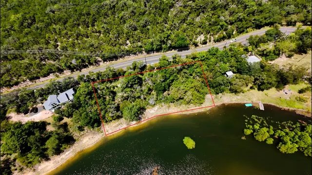 a view of a garden with a lake
