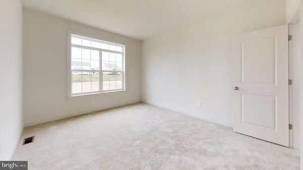 a bathroom with a toilet sink and vanity