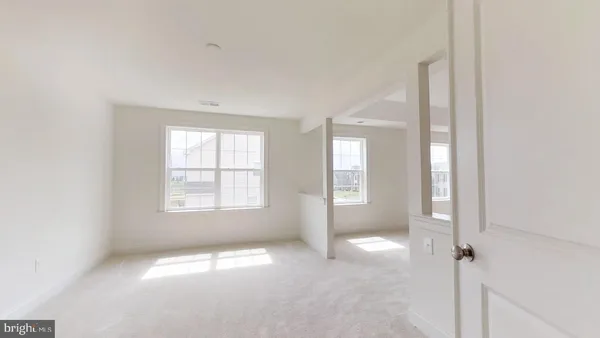 a bathroom with a tub sink shower and mirror