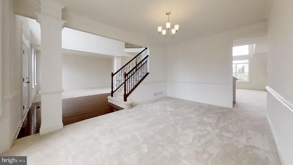 a view of a livingroom with a staircase