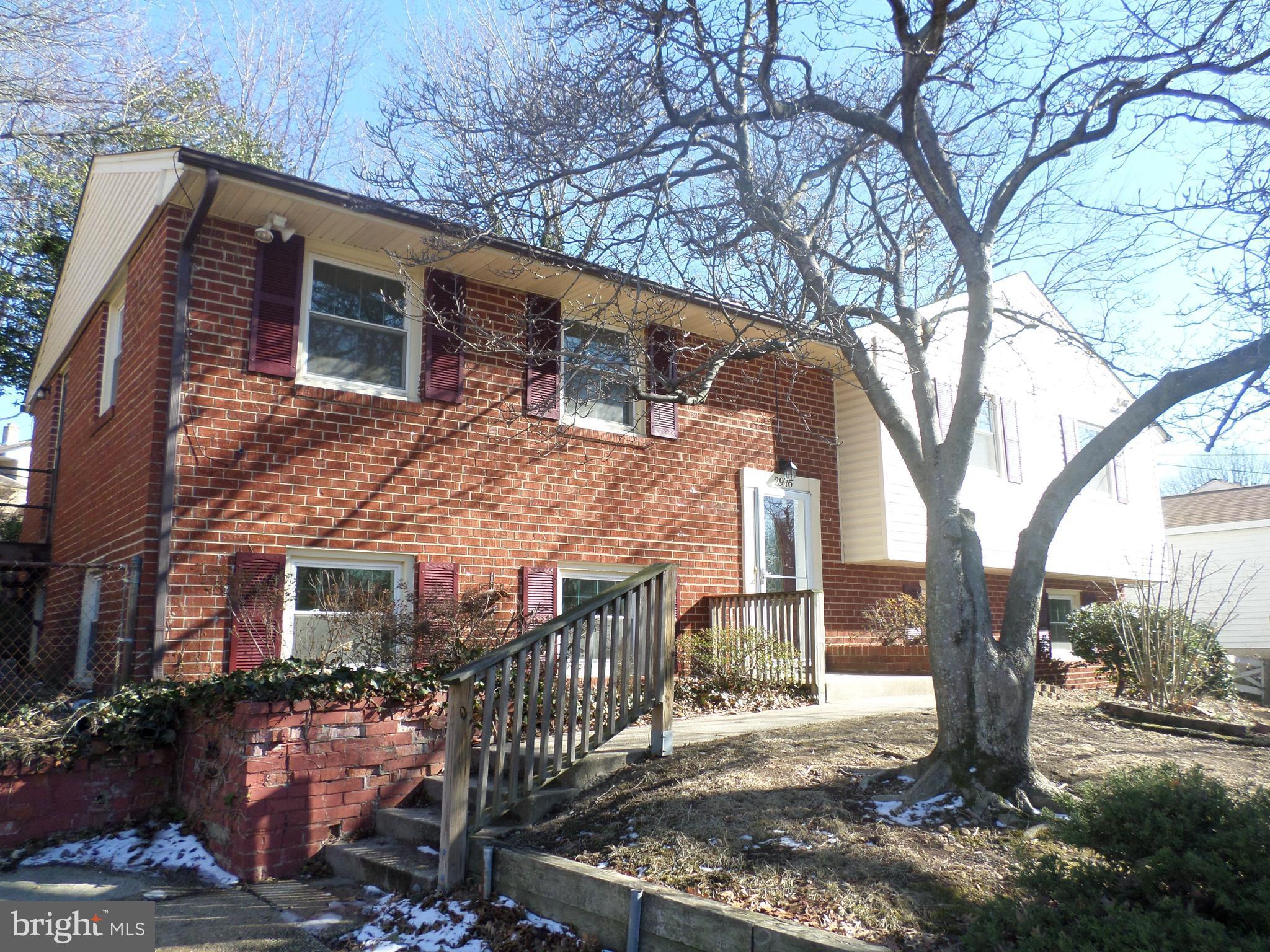 2976 Gracefield Road Silver Spring, MD 20904 - Photo 2 of 25 a front view of a house with a yard