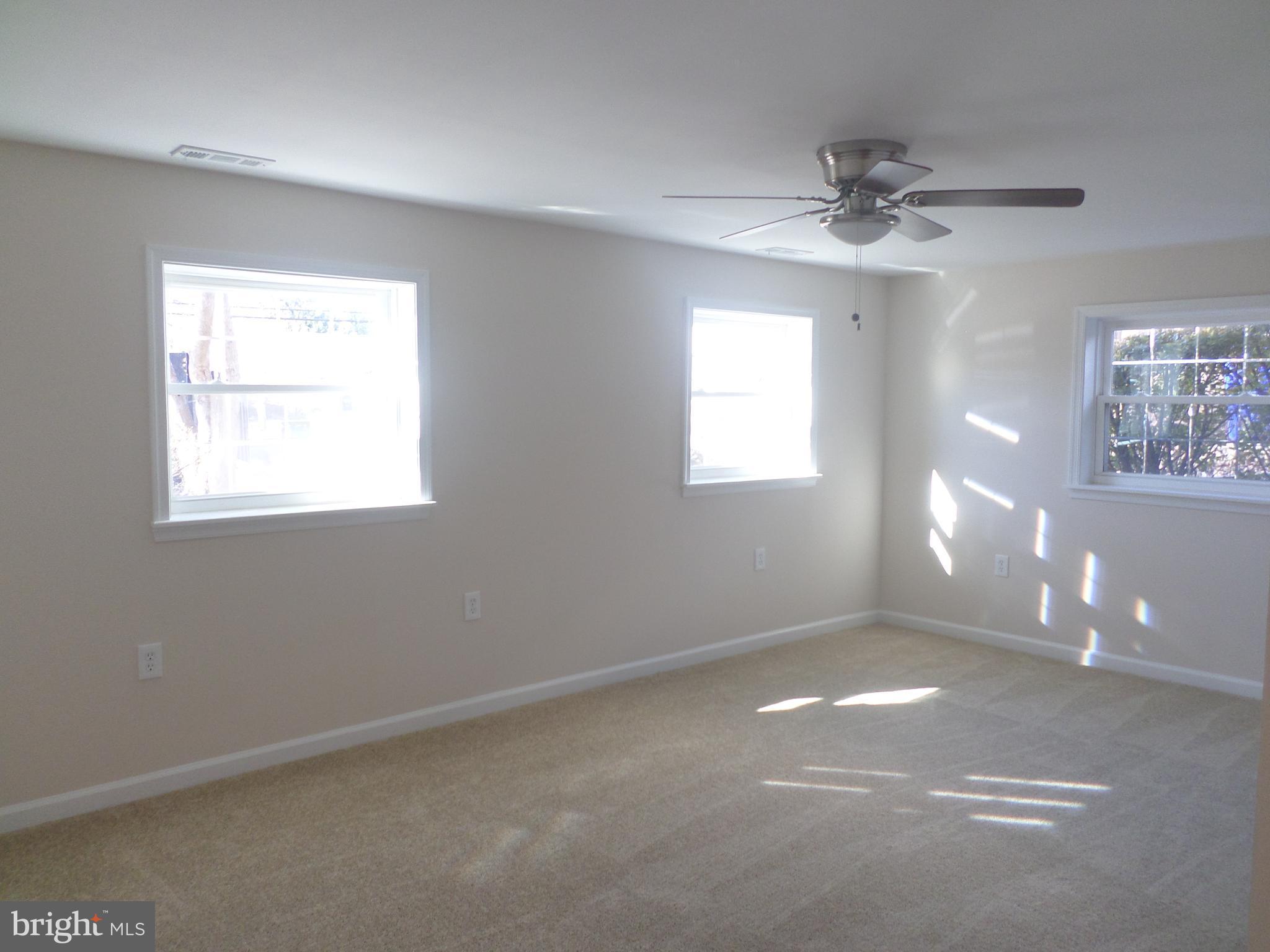 2976 Gracefield Road Silver Spring, MD 20904 - Photo 11 of 25 a view of an empty room with a window