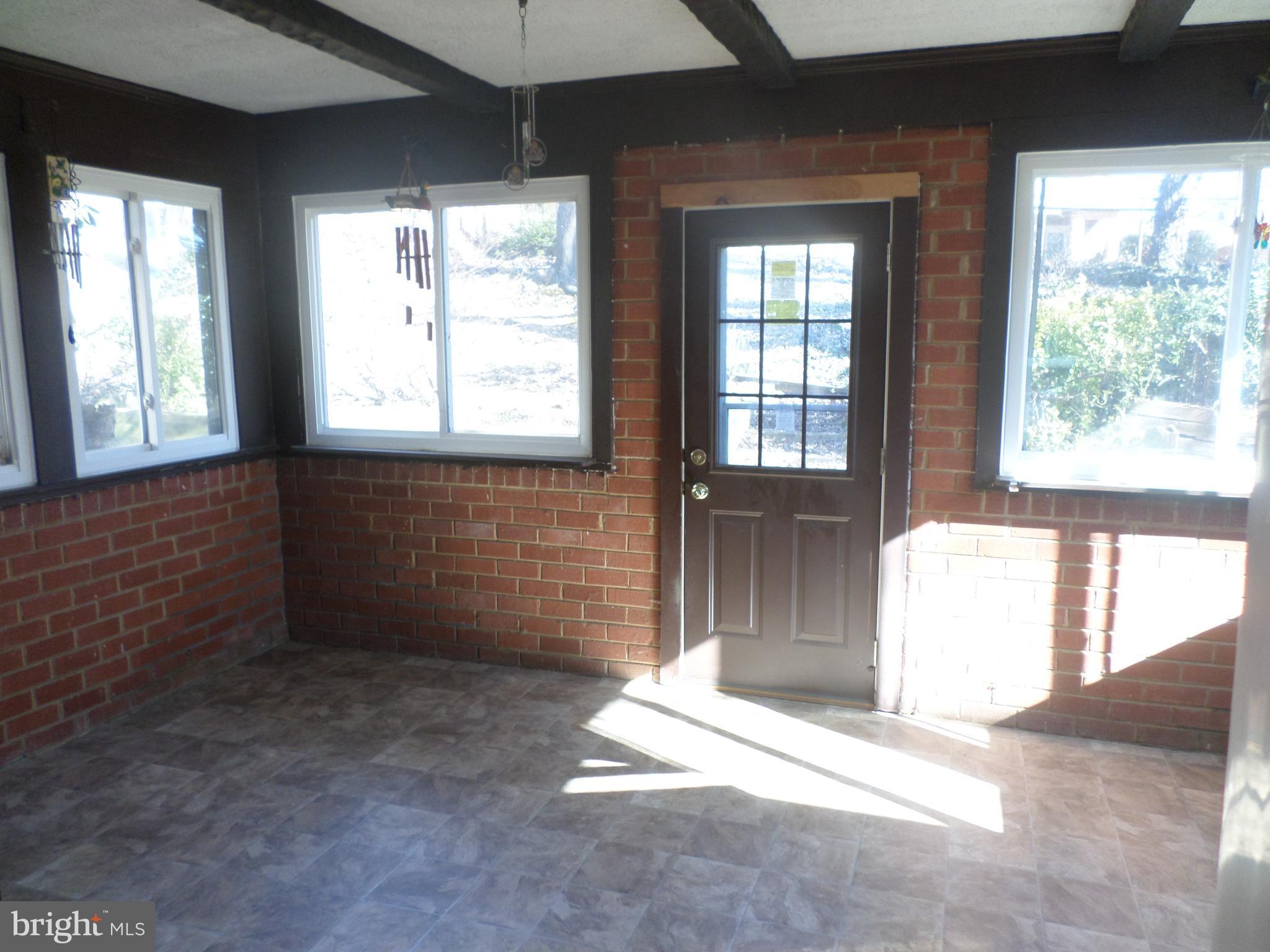 2976 Gracefield Road Silver Spring, MD 20904 - Photo 23 of 25 a view of an empty room with a window