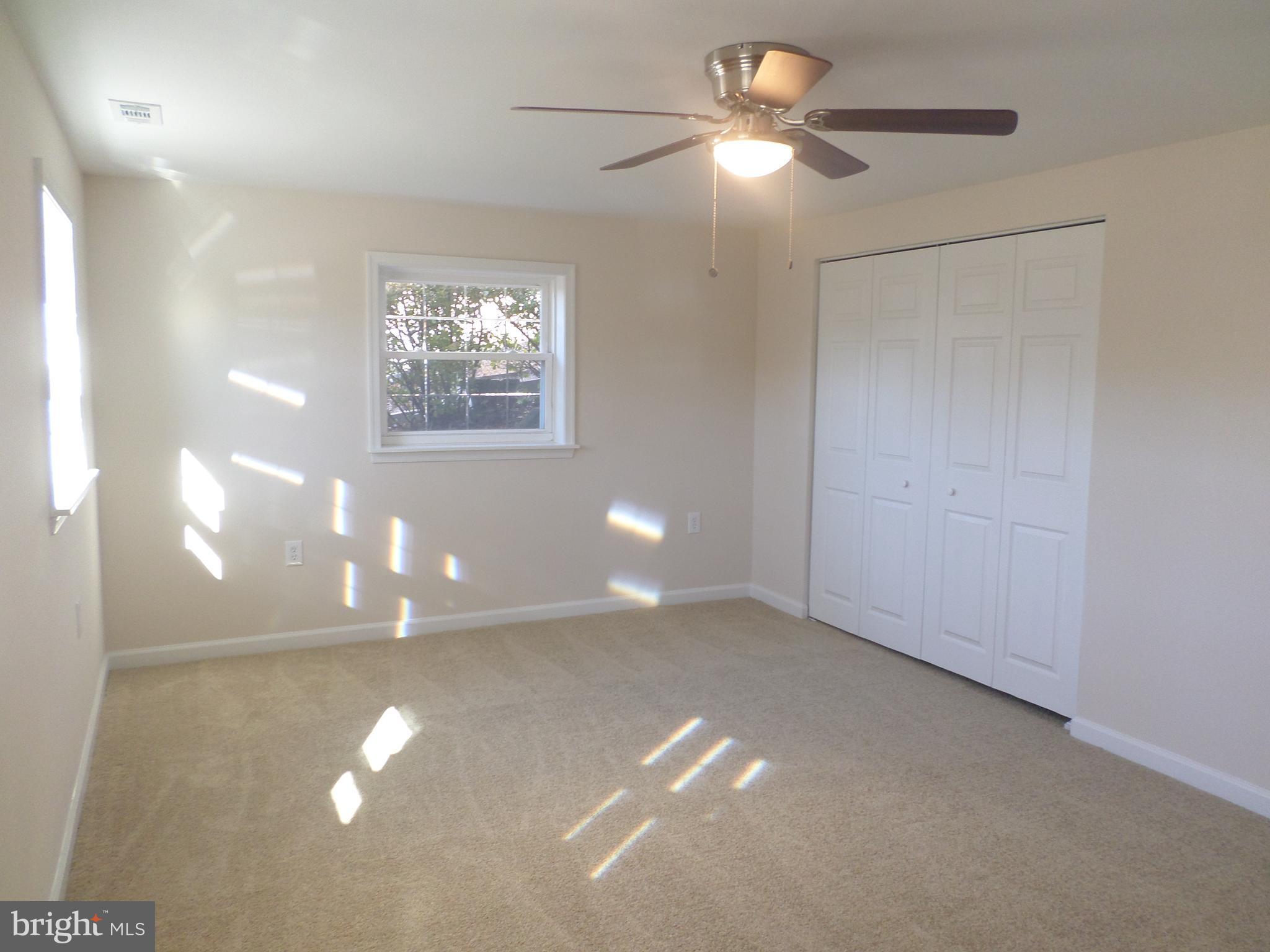 2976 Gracefield Road Silver Spring, MD 20904 - Photo 10 of 25 a view of an empty room with a window