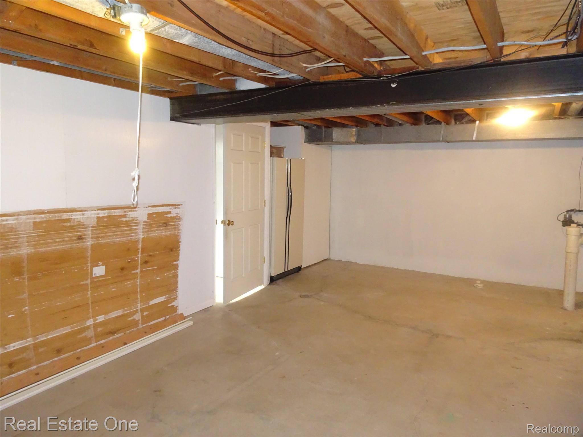 5228 Peekskill Drive Sterling Heights, MI 48310 - Photo 26 of 28 Basement area with build in refrigerator