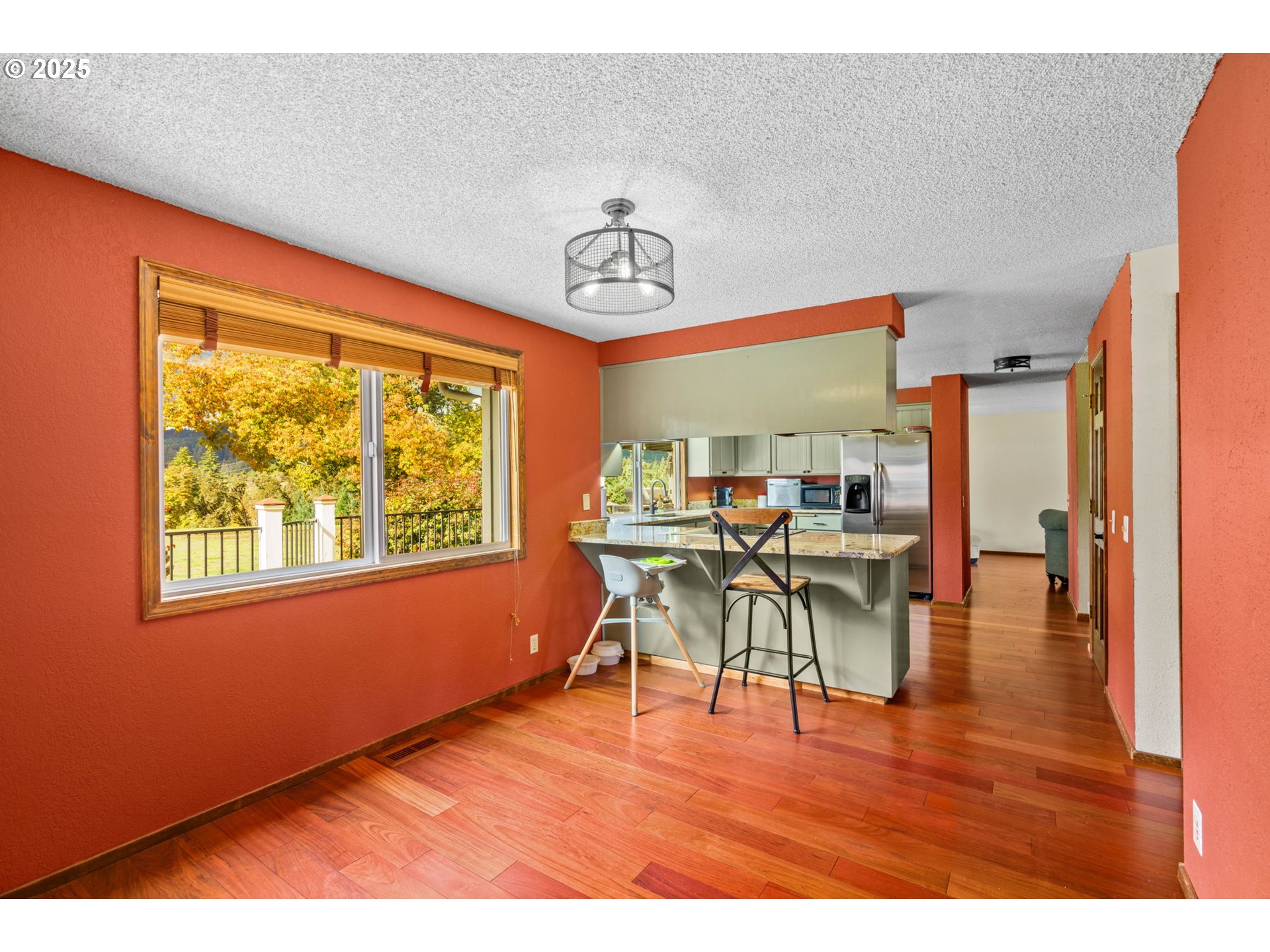 88692 Ermi Bee Road Springfield, OR 97478 - Photo 23 of 41 a dining room with furniture window wooden floor and a rug
