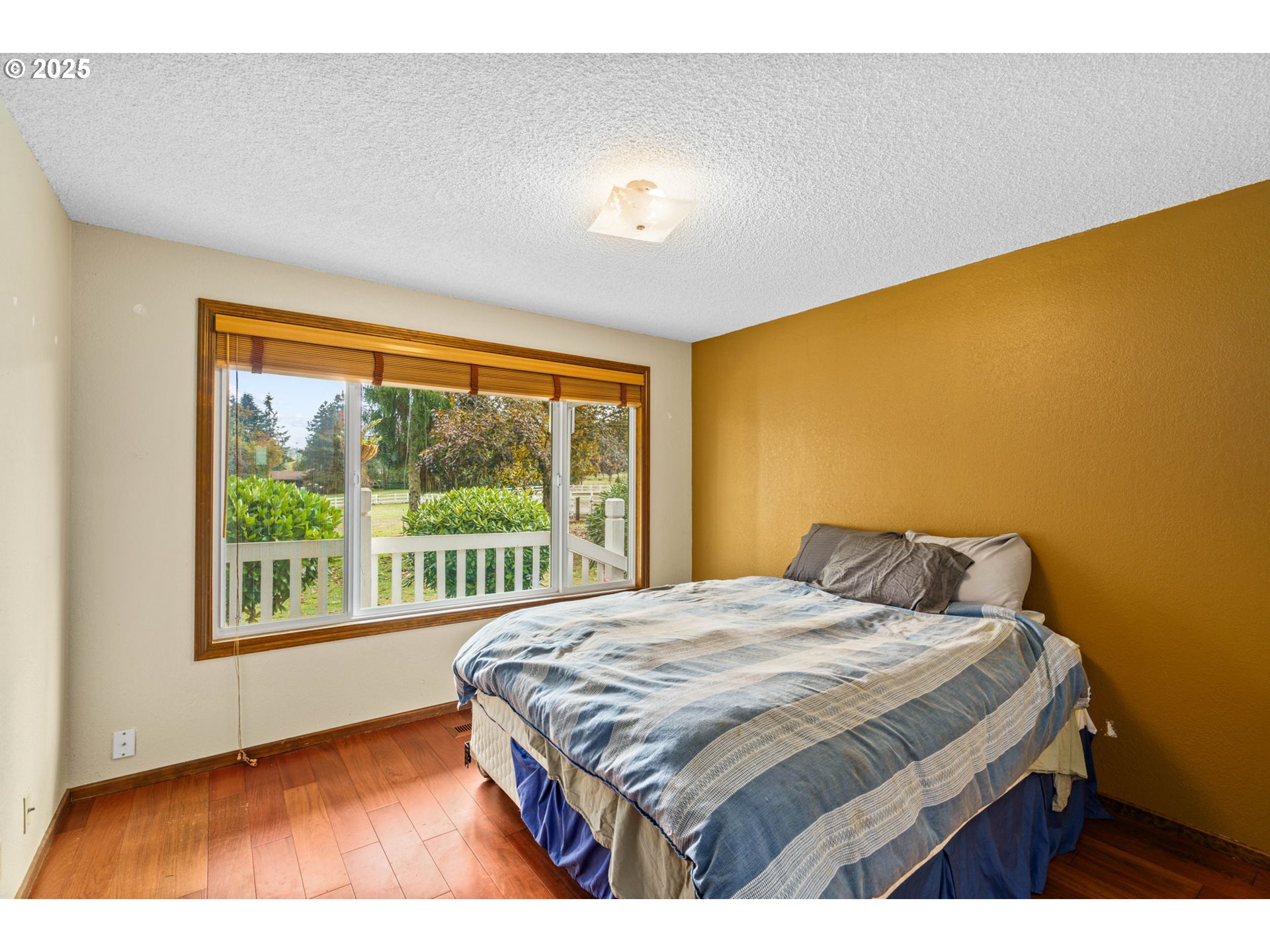 88692 Ermi Bee Road Springfield, OR 97478 - Photo 24 of 41 a bedroom with a bed and a large window