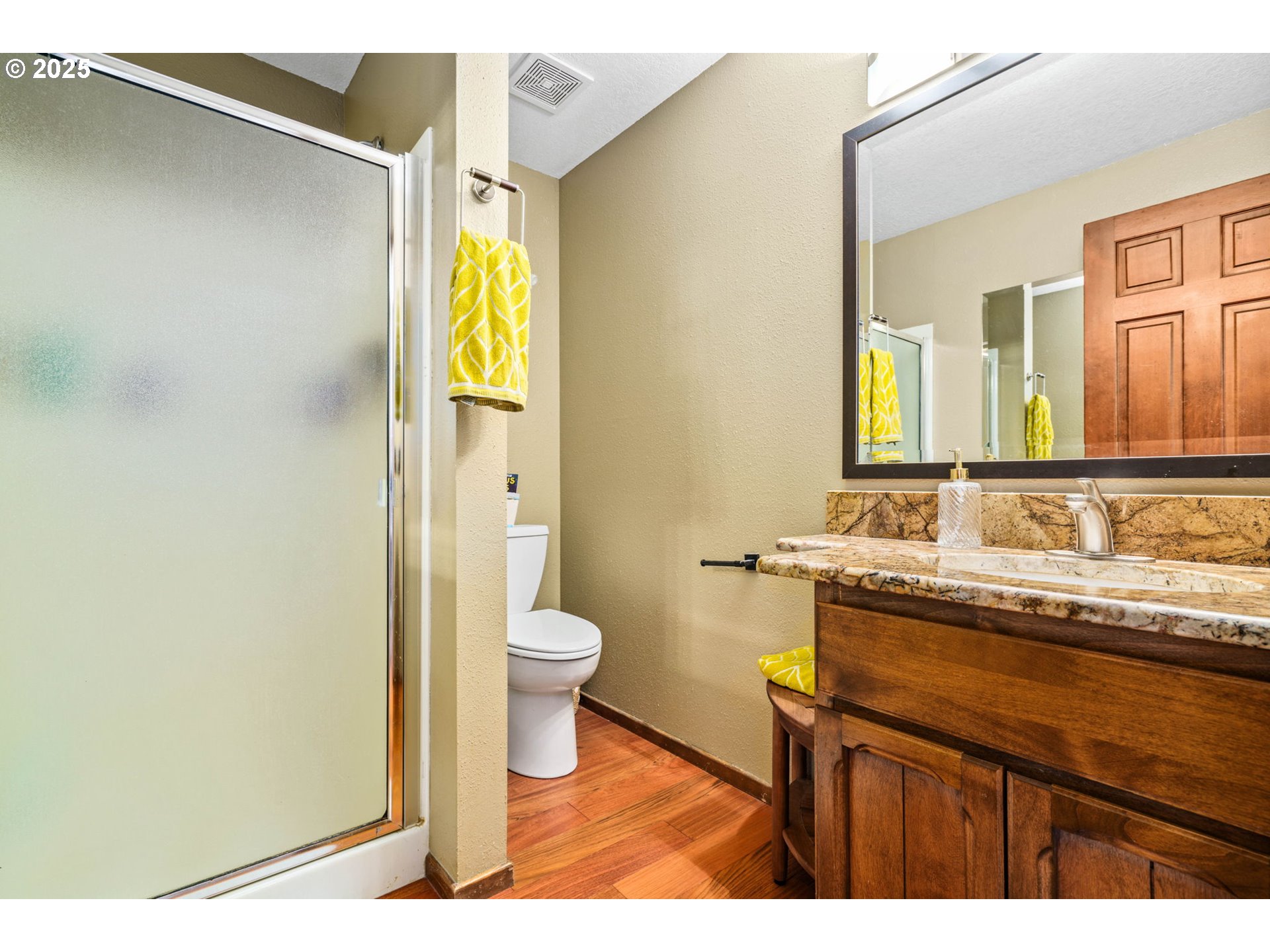 88692 Ermi Bee Road Springfield, OR 97478 - Photo 25 of 41 a bathroom with a sink a toilet and a mirror