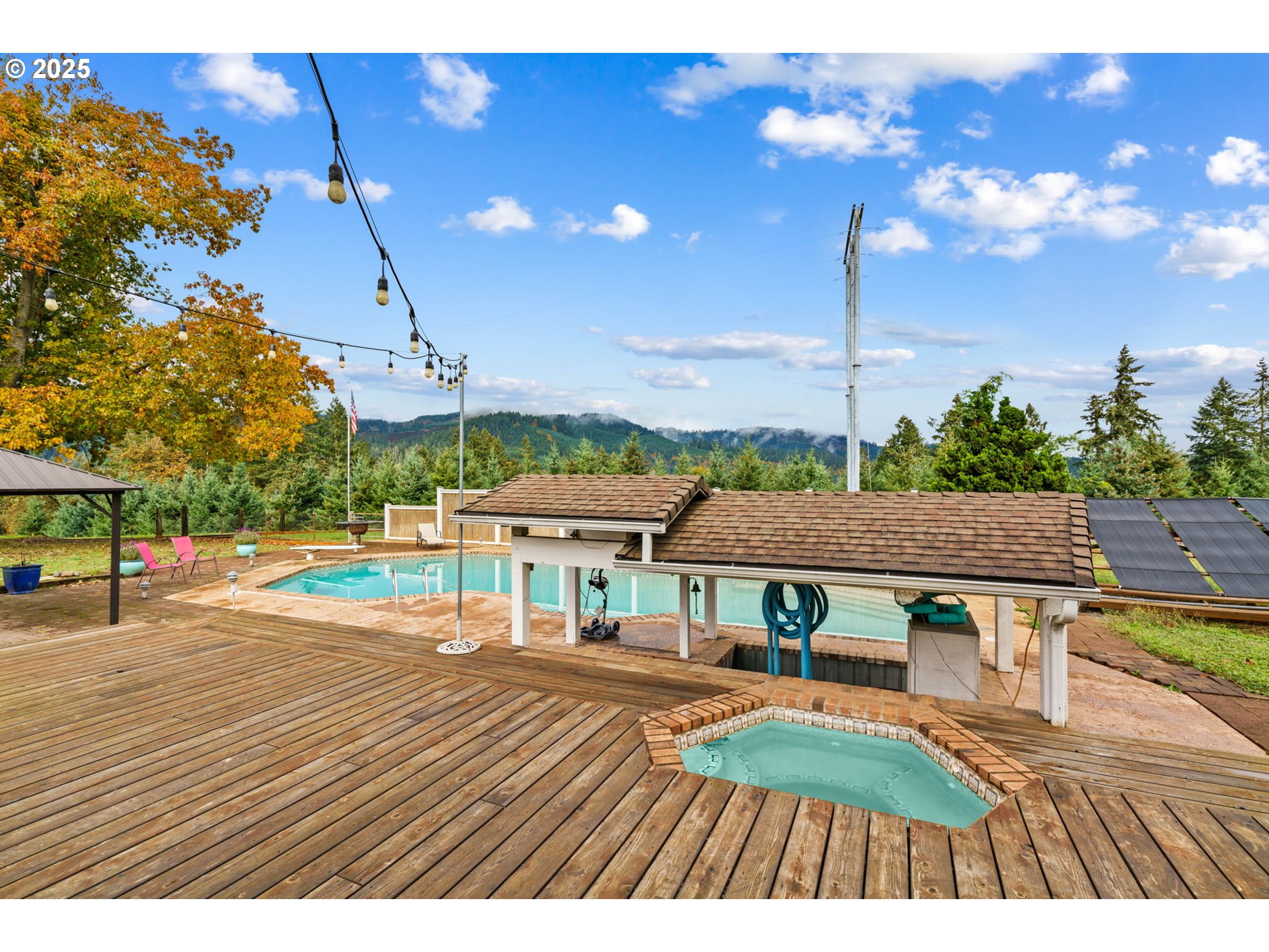 88692 Ermi Bee Road Springfield, OR 97478 - Photo 10 of 41 a view of a patio with a table and chairs